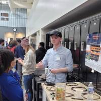 people looking at a senior project